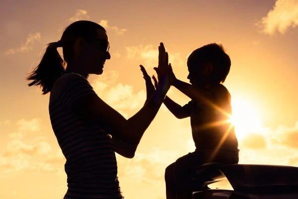 Image of happy mother and child after resolving child arrangements Redditch
